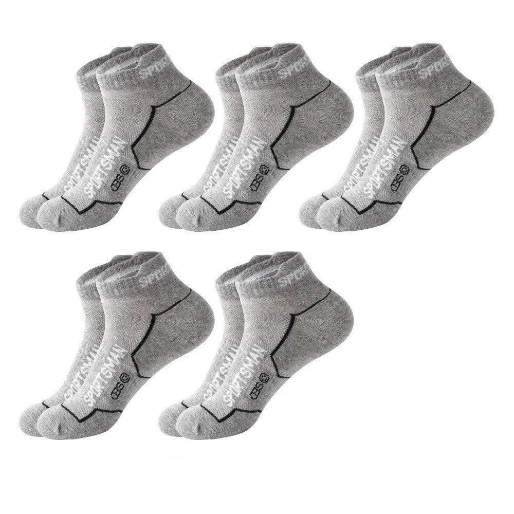 A pack of five gray men's breathable mesh performance socks laid out flat.