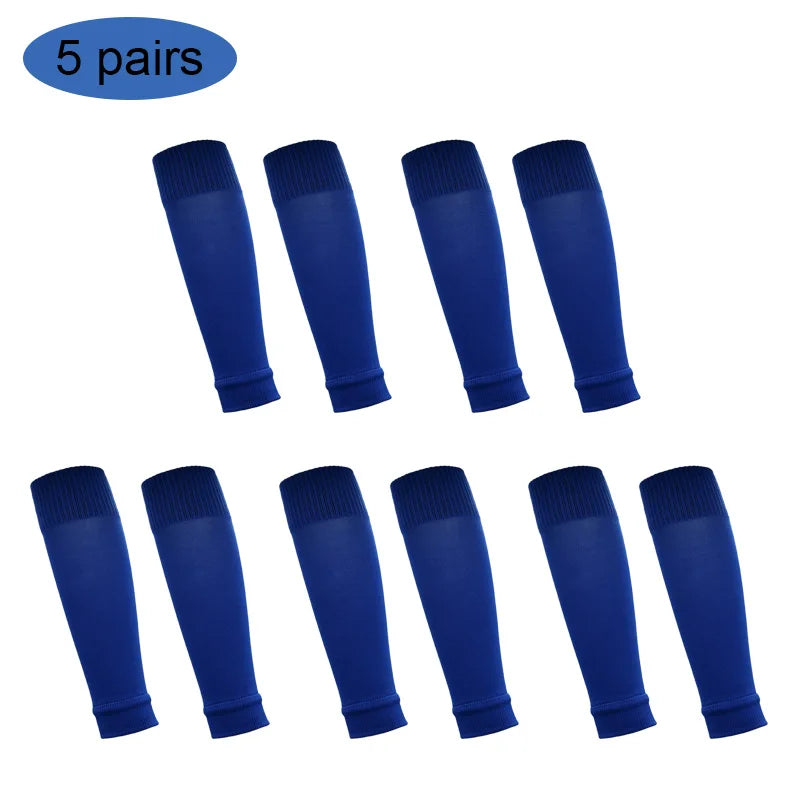 Five pairs of blue football shin guards for leg protection