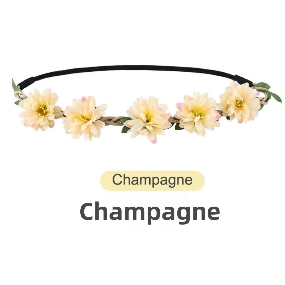 A floral rose wreath crown headpiece with yellow and cream flowers on a black band.