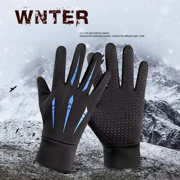 Ein Paar schwarze Thermogreifte mit Touchscreen für Winter, vor einer verschneiten Bergkulisse.