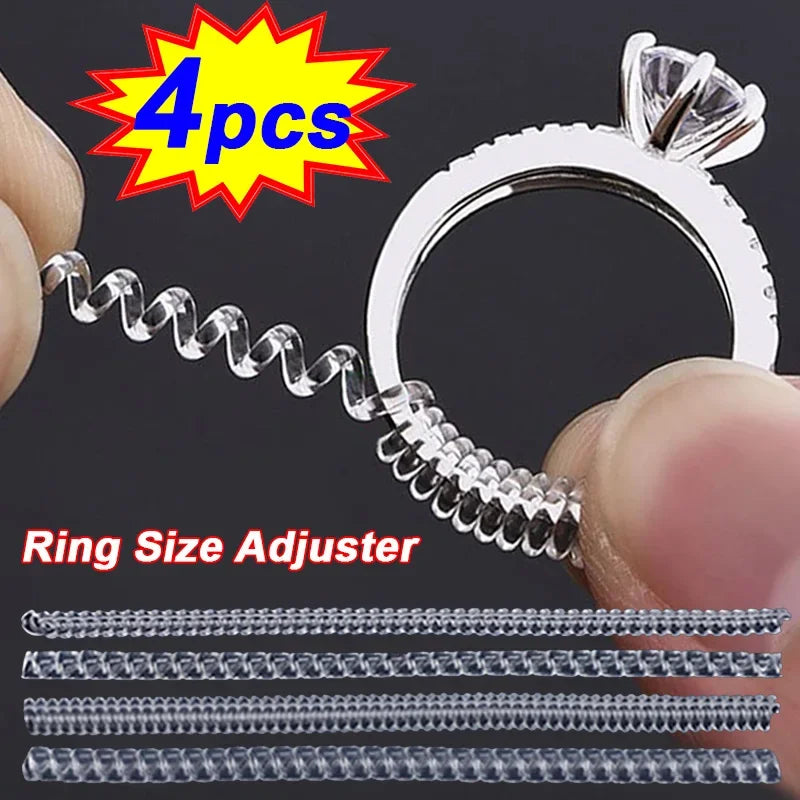 A set of four invisible ring size adjuster tools for resizing rings, shown with a silver ring and adjustment pieces.