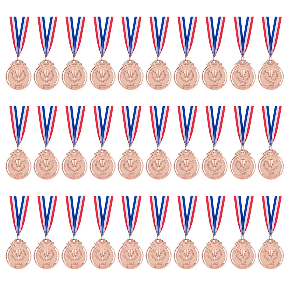 A row of gold, silver, and bronze award medals suspended by blue, white, and red ribbons.