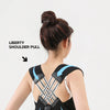 A woman wearing a black posture back brace with silver accents demonstrates the big pull and straight back stretch.