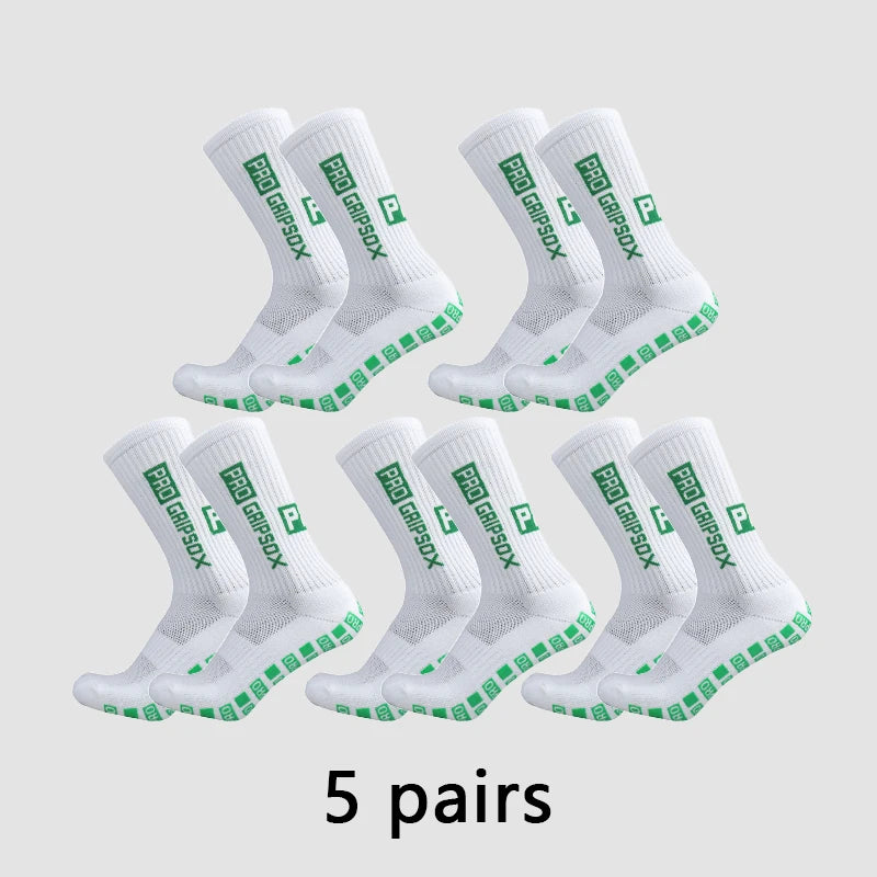 Five pairs of white anti-slip grip soccer socks displayed on a light gray background.