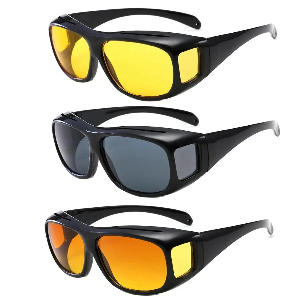 A set of black and yellow night vision driving sunglasses shown from a top-down view.