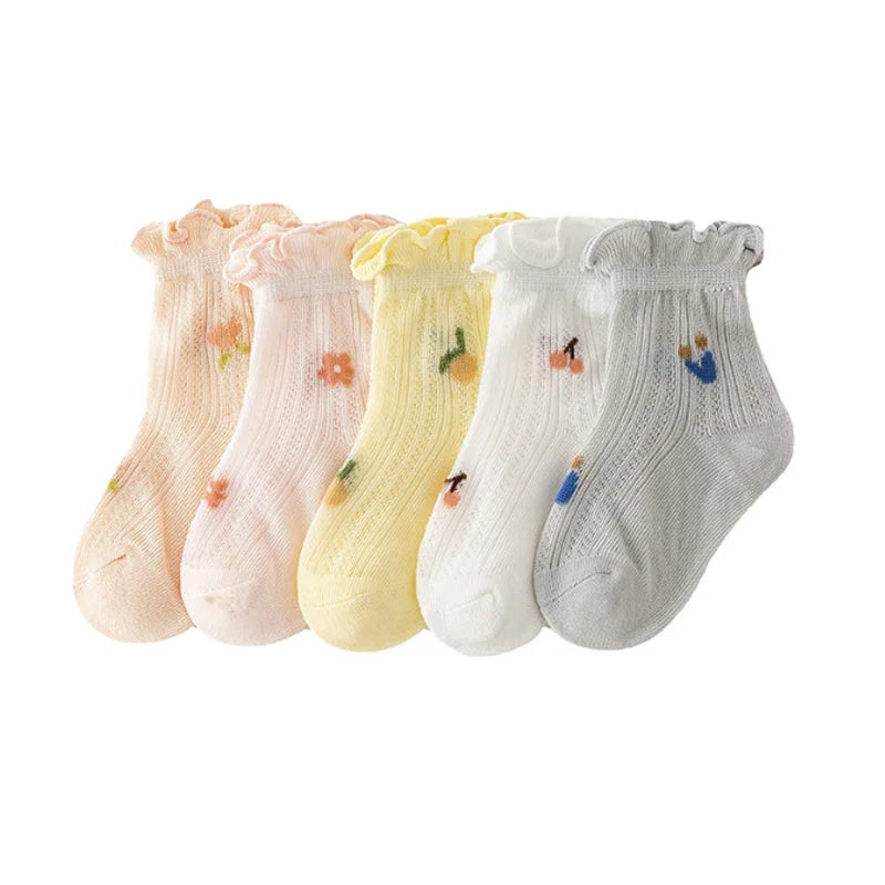 A pack of three thin summer casual baby socks in pastel colors including pink, yellow, and gray.