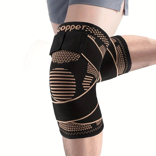 Manche de compression en cuivre noir sur la jambe d'une personne.