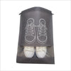A clear plastic shoe storage bag with a gray non-woven fabric sleeve and a white outline of a shoe.