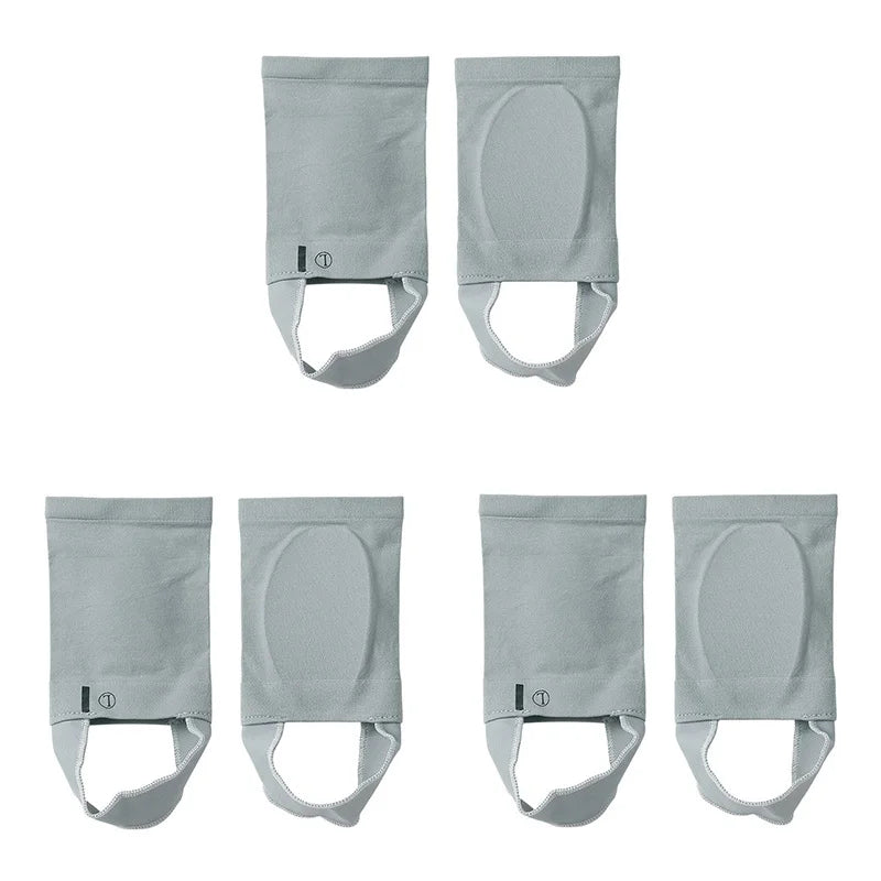 Four pairs of light gray silicone arch support insoles for foot comfort shown in different views