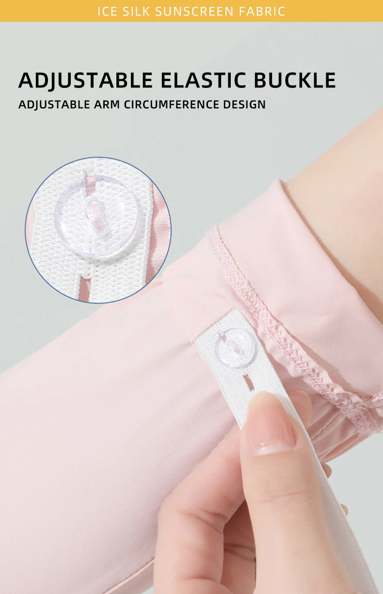Close-up of a pink sun protection arm sleeve with an adjustable elastic buckle detail.
