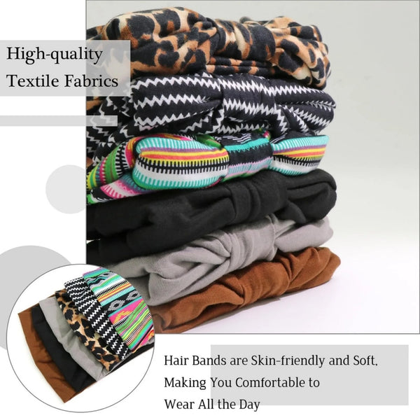 A stack of various colored and patterned hair bands, including leopard print, textile fabrics, and solid colors.