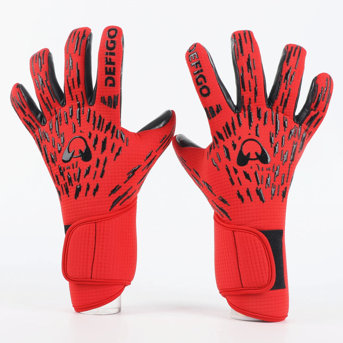 Pair of red and black Defigo professional football goalkeeper gloves