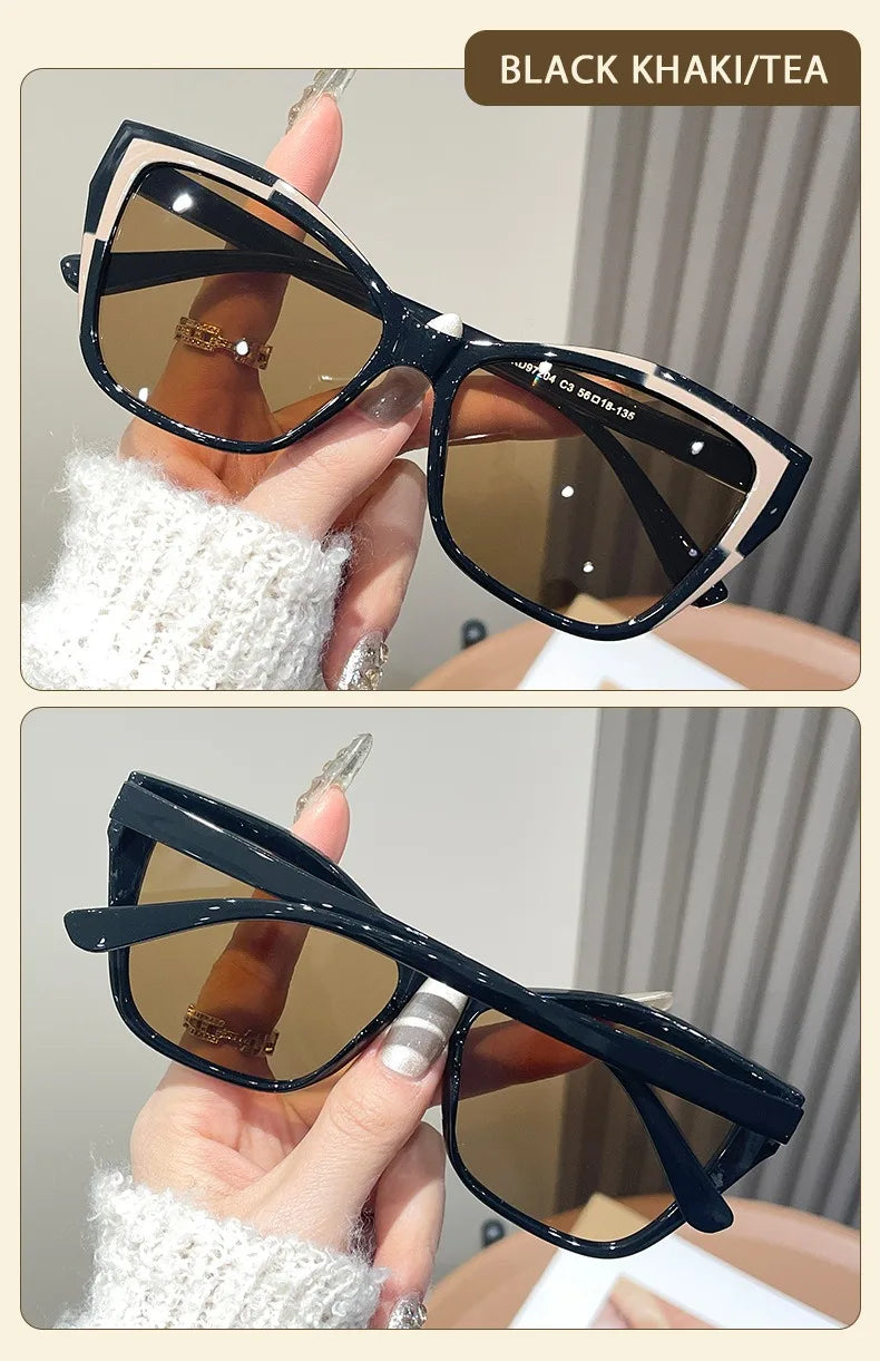 Black khaki/tea vintage square cat eye sunglasses being held by a hand