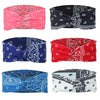 A collection of eight colorful bohemian print wide headbands for yoga and running.