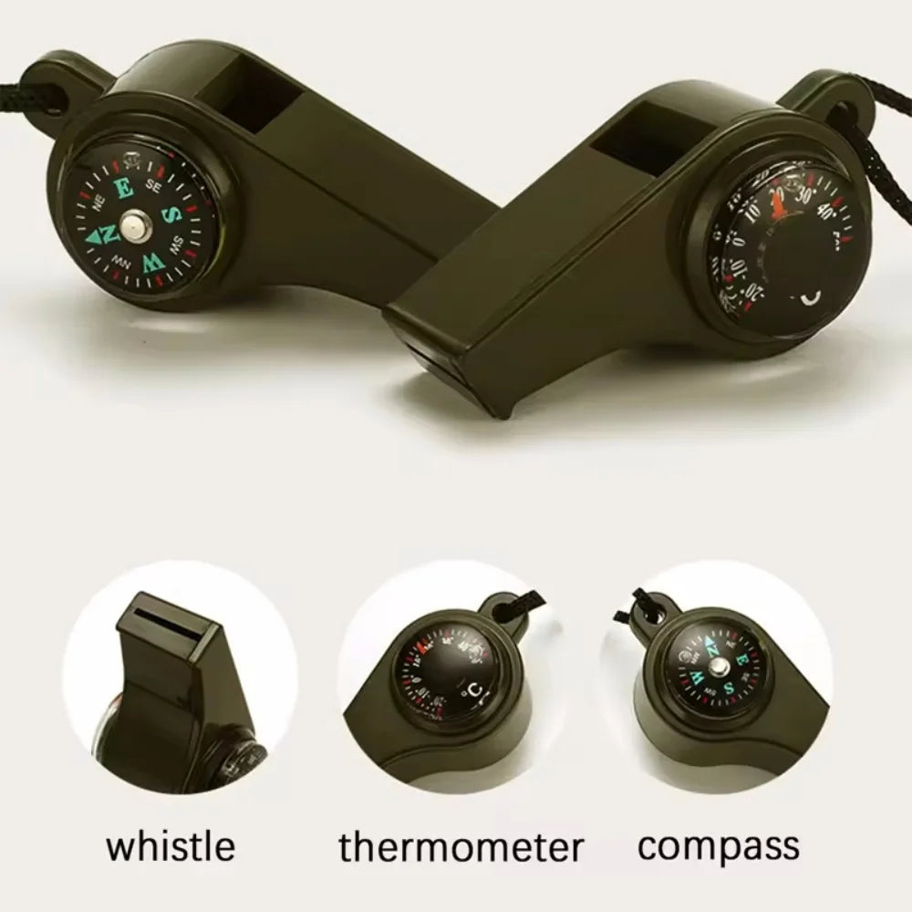 A dark green multi-function survival kit featuring a whistle, thermometer, and compass.