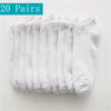 Ein Stapel von 20 Paar weißen, atmungsaktiven Polyester-Baumwoll-Socken für Herren.