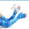 Blue camouflage patterned cooling sun protection arm sleeves shown on a hand and forearm.