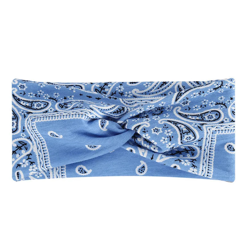 Blue bohemian print wide headband featuring intricate floral and paisley patterns