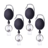 A set of black retractable ID badge reel keychains with silver rings.