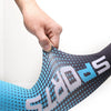 A hand is pulling on a blue and black sports sleeve for outdoor activities.