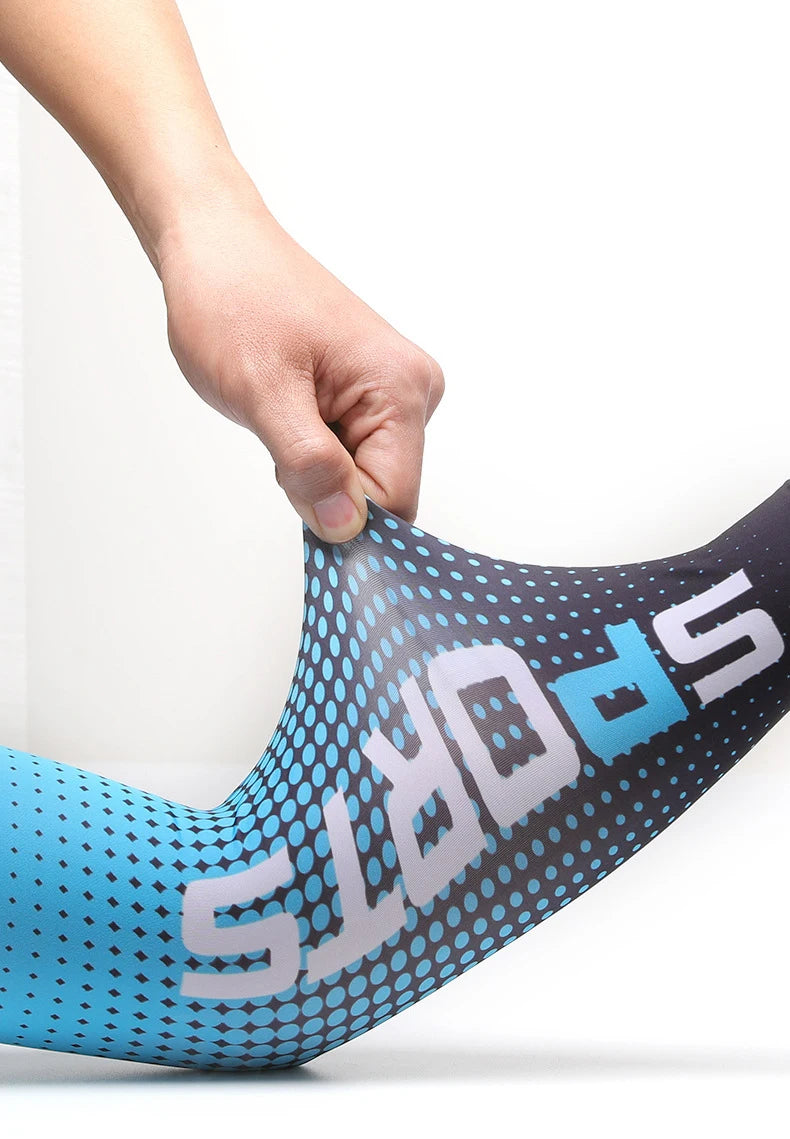 A hand is pulling on a blue and black sports sleeve for outdoor activities.