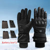 A pair of black heated thermal gloves and two battery boxes are shown against a snowy background.