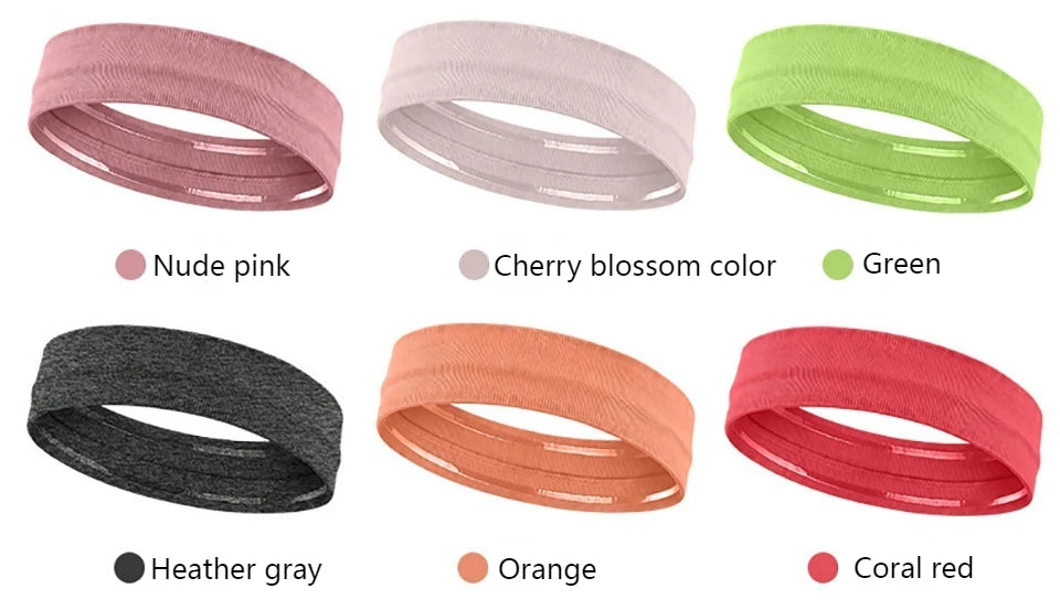 Eine Sammlung elastischer Sport-Headbänder in verschiedenen Farben, darunter Nude-Pink, Kirschblüte, Grün und Heathergrau.
