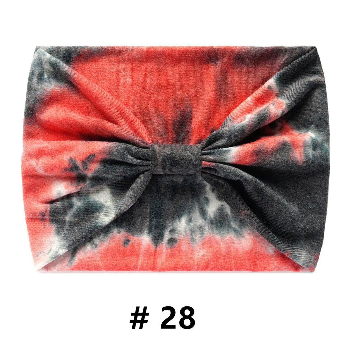 Bandeau en coton tie-dye plié aux couleurs rouge et gris vibrantes.