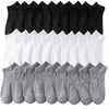 Eine Reihe schwarz-weißer Knöchelsocken für Freizeitkleidung.