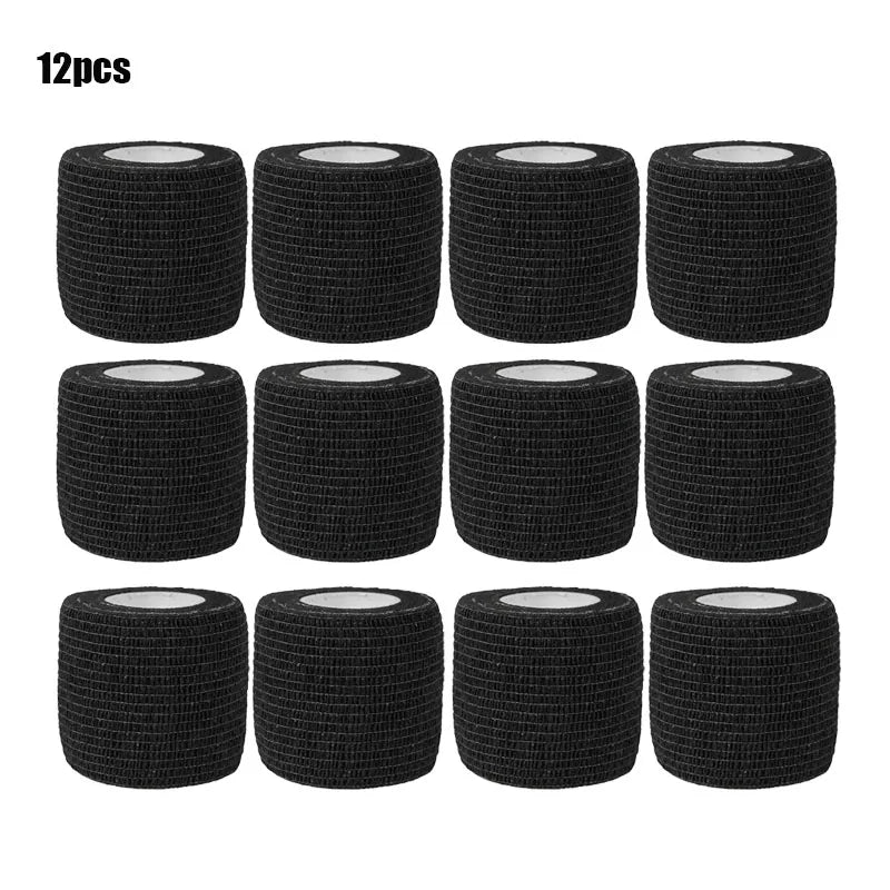Twelve black elastic adhesive bandages in a circular roll format.