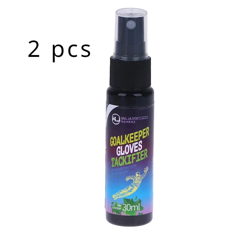A bottle of goalkeeper gloves tackifier spray with a black pump dispenser and a blue liquid.