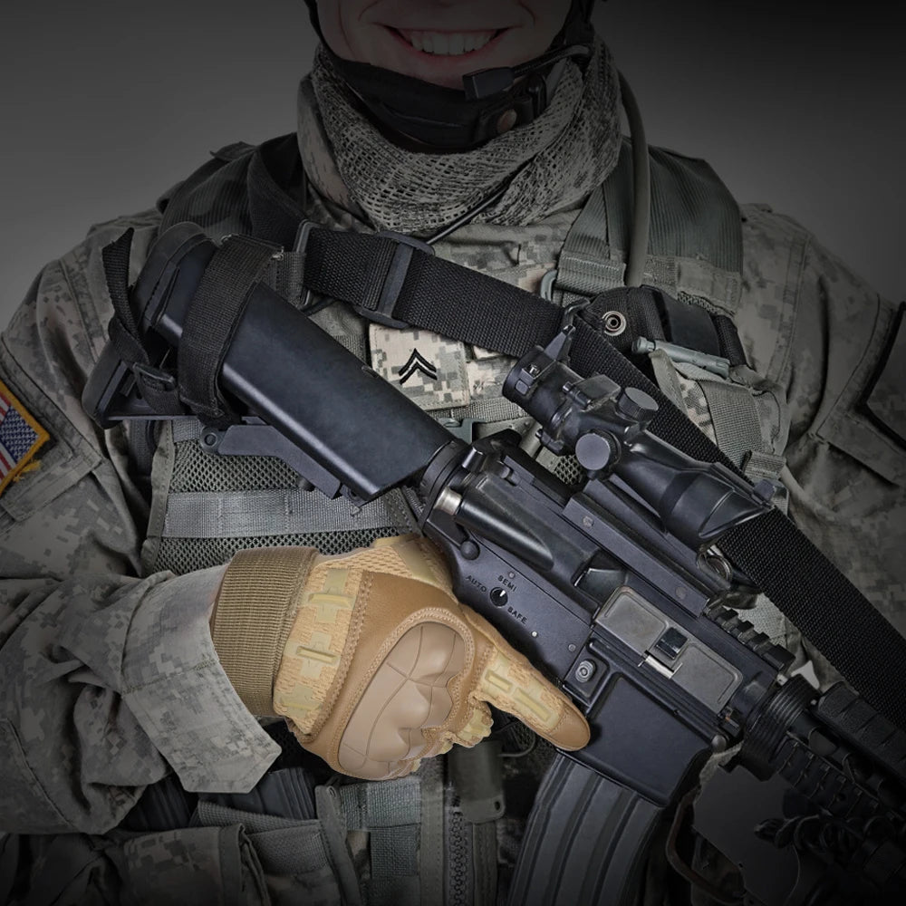 A person wearing tactical gear is holding a black rifle and wearing tan cycling gloves.
