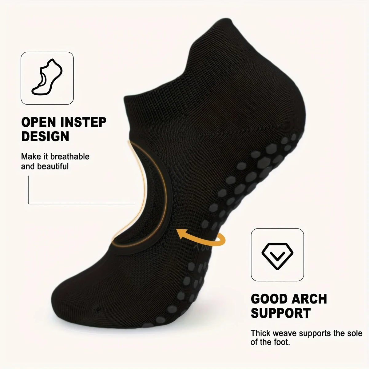 Black non-slip pilates yoga socks showing an open instep design and arch support features.