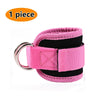 One piece of pink and black adjustable neoprene ankle straps for leg training.