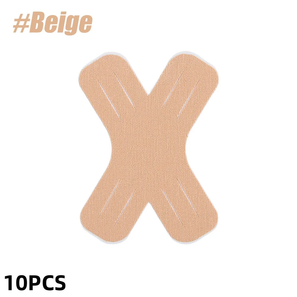 A set of ten beige kinesiology tape strips shaped like an 'X' for joint support.