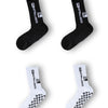 Four pairs of black and white men's athletic soccer socks with anti-slip grip