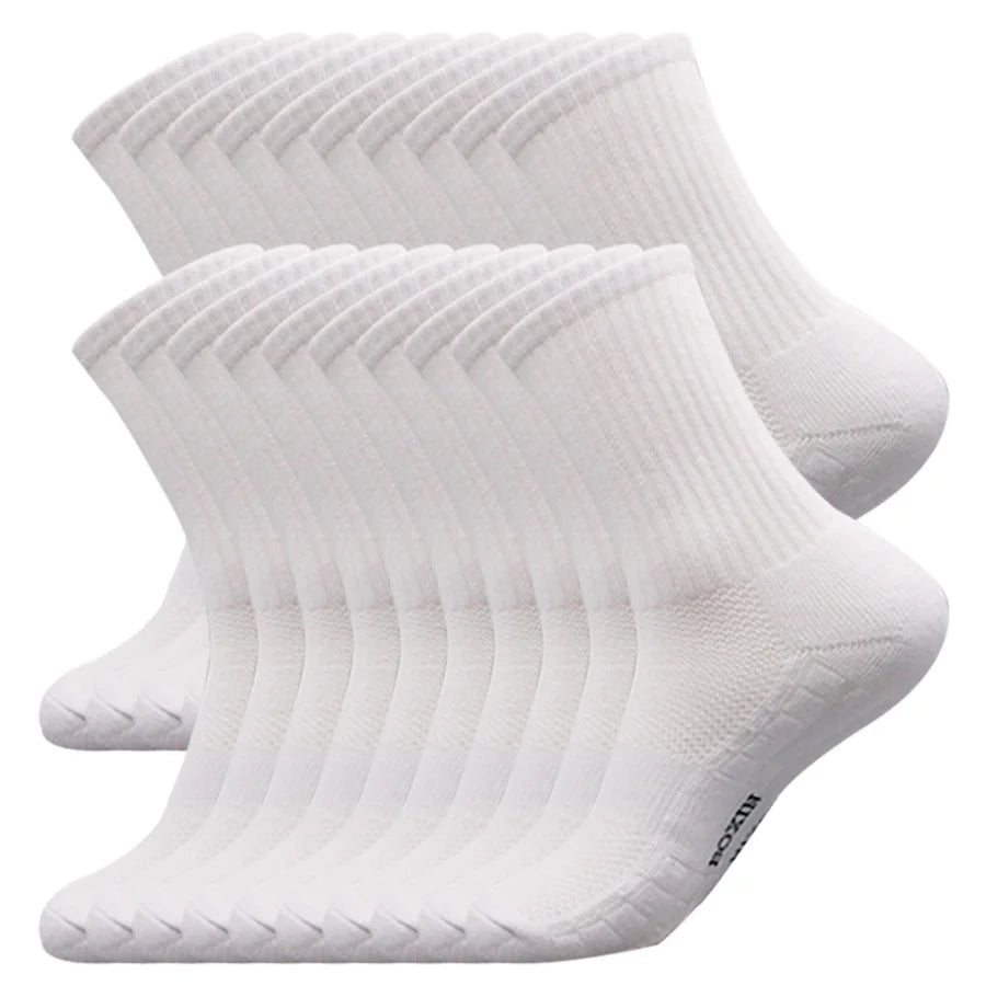 A stack of white men's essential warm socks for outdoor activities