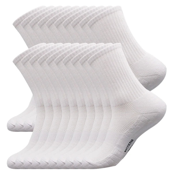 A stack of white men's essential warm socks for outdoor activities
