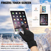 A hand wearing black insulated winter gloves touches a finger screen on an iPad in a snowy outdoor setting.
