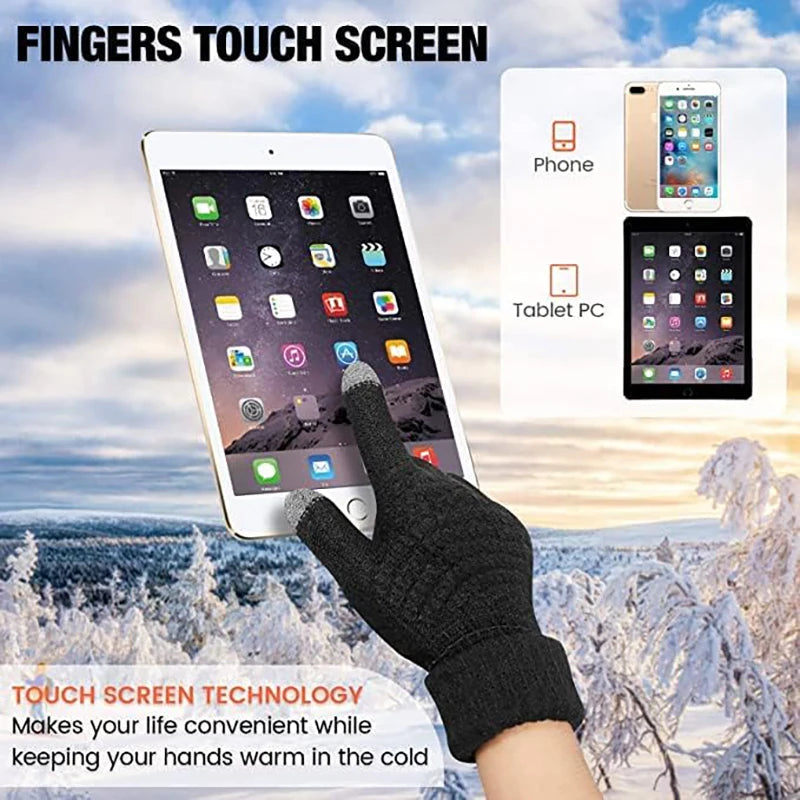 A hand wearing black insulated winter gloves touches a finger screen on an iPad in a snowy outdoor setting.