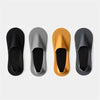 Four pairs of men's invisible boat socks in black, gray, gold, and black are displayed side by side.