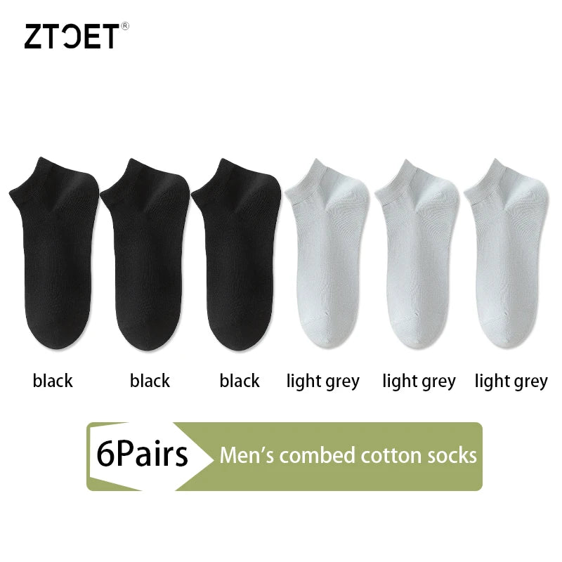 Six pairs of men's combed cotton socks in black and light grey colors displayed side by side.