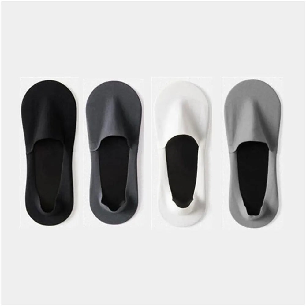 Four pairs of men's invisible boat socks in black, gray, and white are displayed side by side.