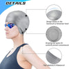 A woman wearing a gray silicone swimming cap designed on the framework of an American head, highlighting its ear space and el