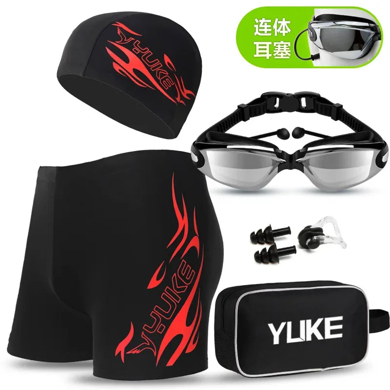 Black men's swim suit set including a cap, goggles, and ear plugs