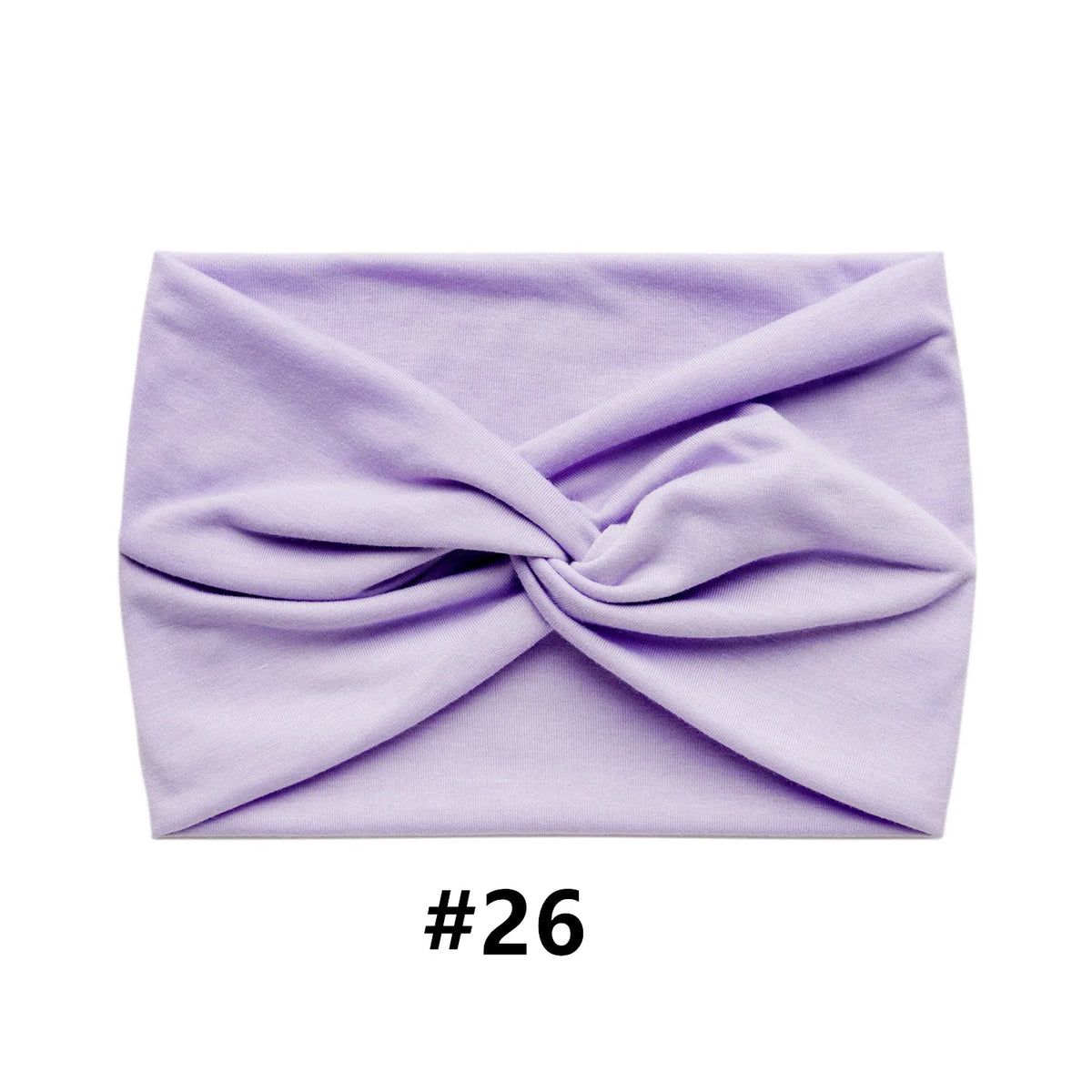 A lavender boho wide turban headband folded into a knot.