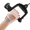 Pink half finger sports gloves being worn on a wrist for weight lifting or exercise.