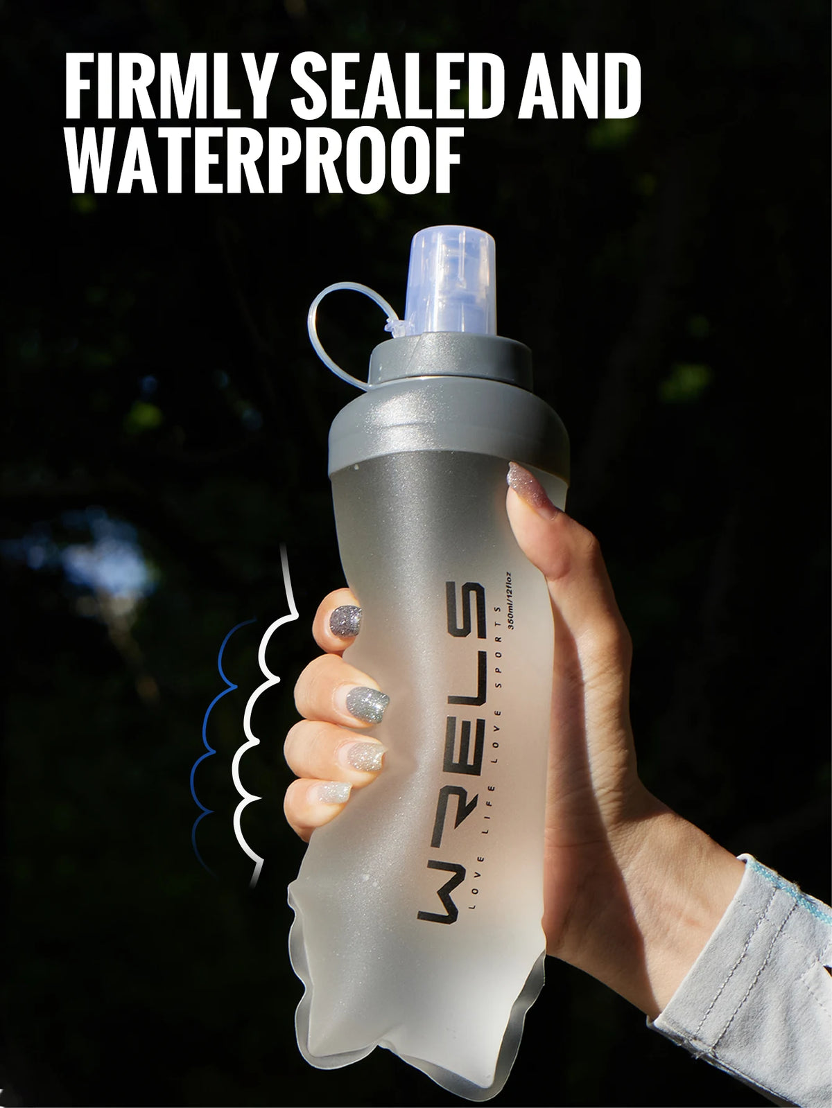 A hand holds a clear silicone water bottle with a pump dispenser, emphasizing its firmly sealed and waterproof quality.