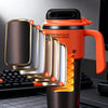 Orange insulated stainless steel tumbler with a lid, straw, and handle, showing its multi-layer insulation design.