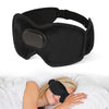 A black sleep headphone is shown resting on a white pillow next to a person's face.